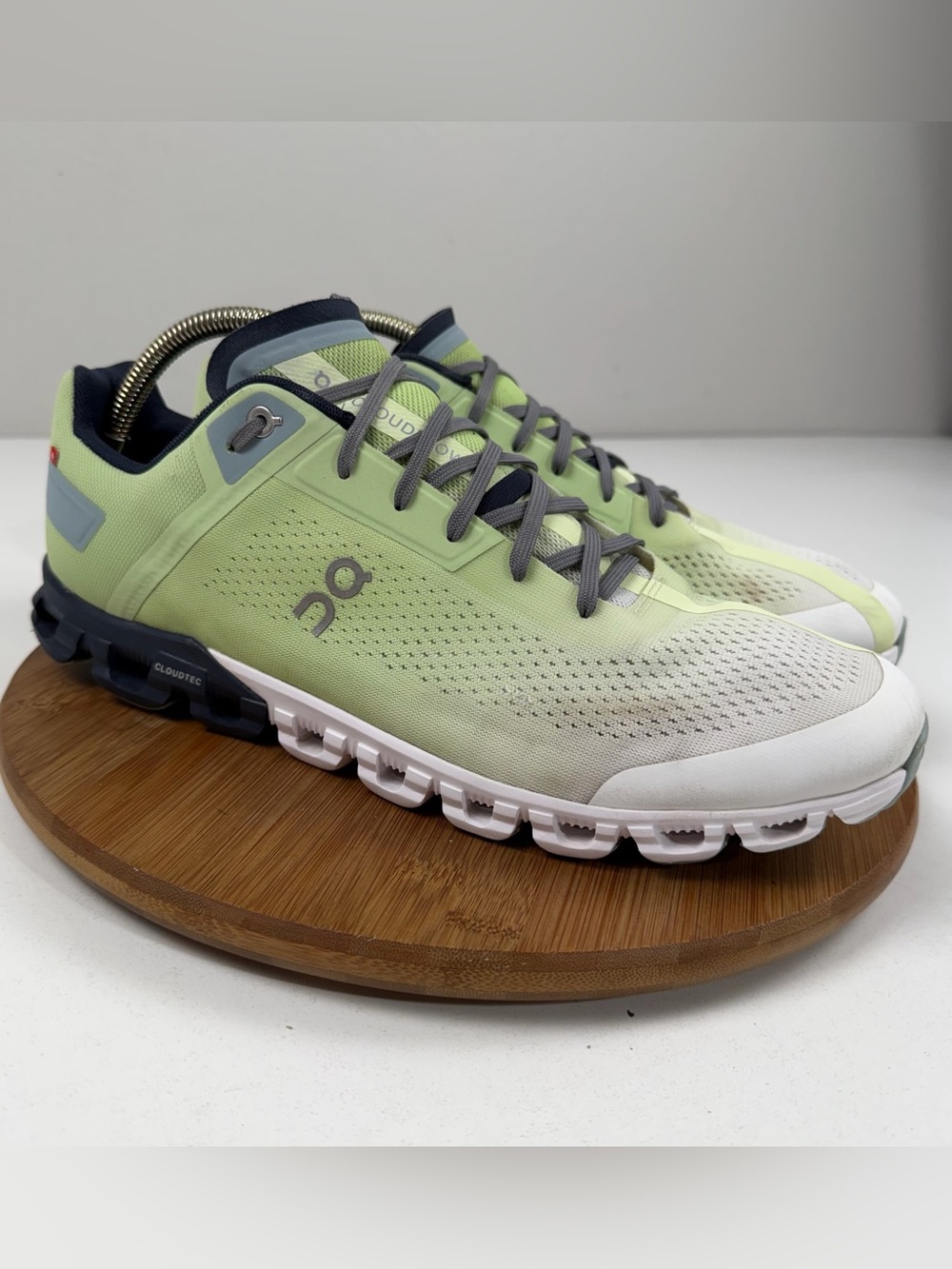 On Cloudflow Running Shoes in Lime Green and White